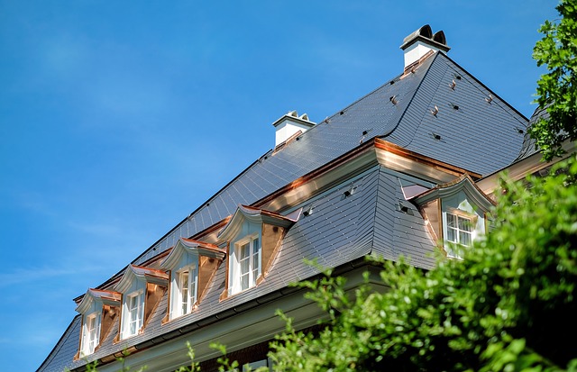 big house with metal roof shingles